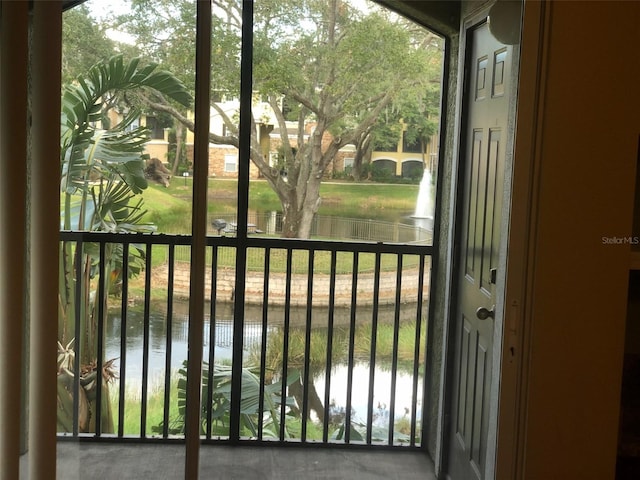 entryway featuring a water view