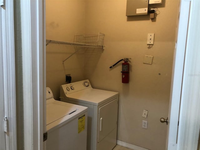 laundry room with independent washer and dryer