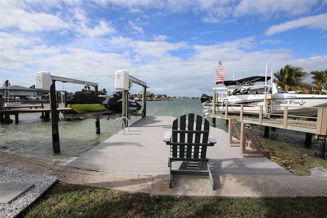 dock area featuring a water view and boat lift