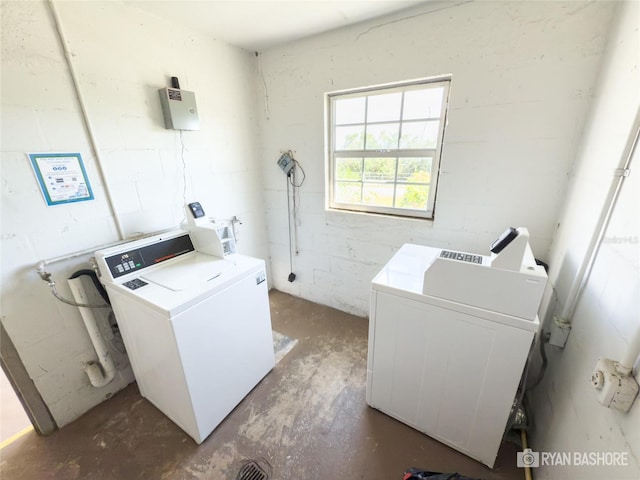 washroom with washing machine and dryer