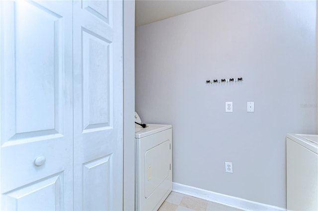 laundry area featuring washing machine and dryer