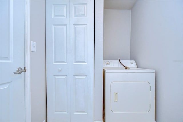 laundry room featuring washer / dryer