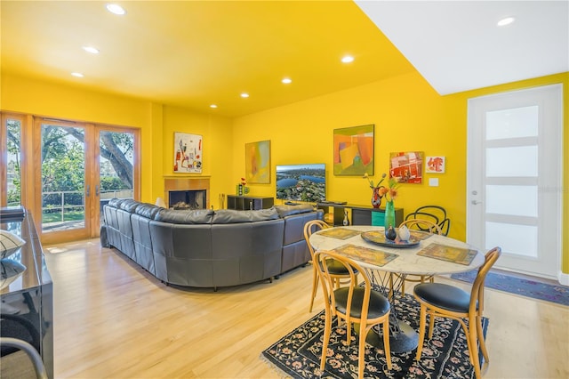 dining space featuring light wood-type flooring