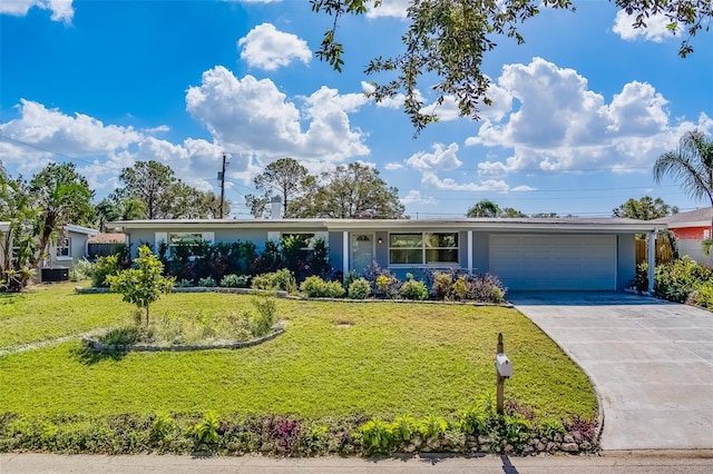 single story home with a garage and a front lawn