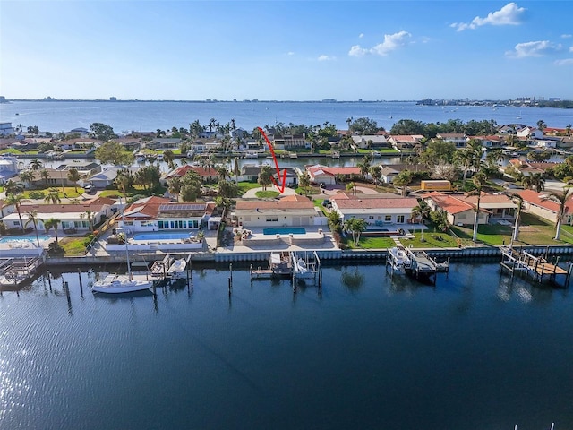 bird's eye view with a water view