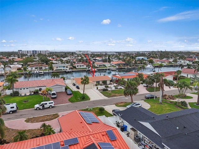 bird's eye view with a water view