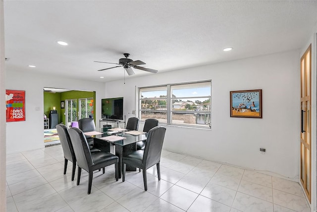 dining room featuring ceiling fan and recessed lighting