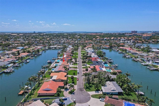 bird's eye view with a residential view and a water view