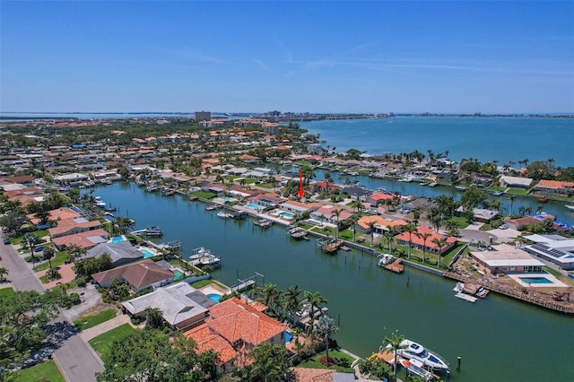 aerial view with a residential view and a water view