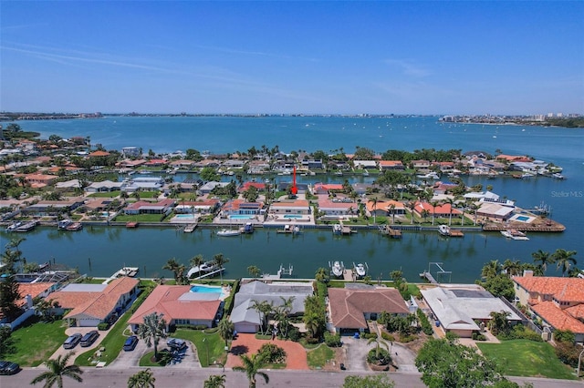 aerial view with a water view and a residential view