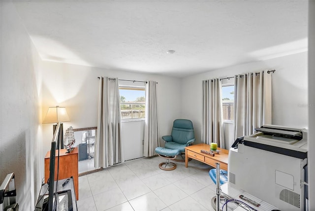 home office featuring light tile patterned floors