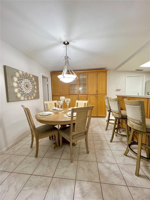 dining area with baseboards