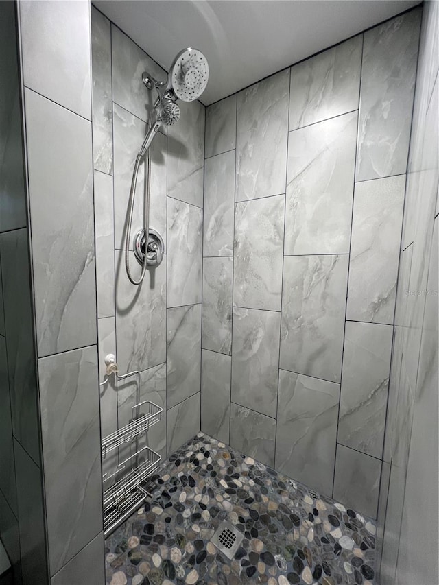 bathroom featuring a shower stall