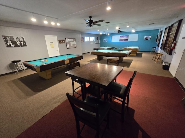 recreation room featuring pool table, track lighting, carpet flooring, and ceiling fan