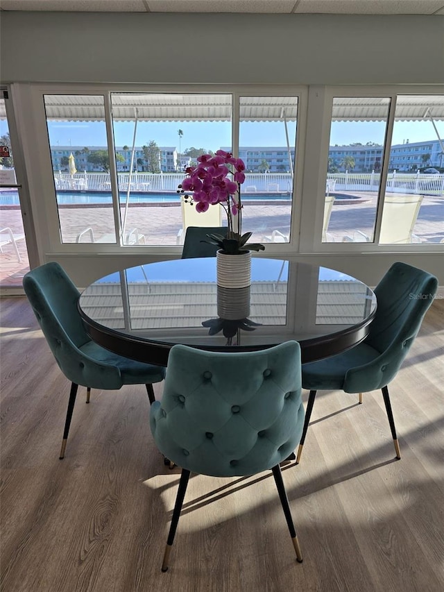 dining area with wood-type flooring