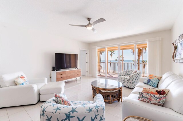 16500 Gulf Blvd Unit 352, North Redington Beach, FL 33708 - living room featuring light tile patterned flooring and ceiling fan