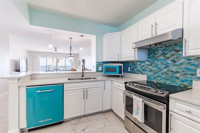 16500 Gulf Blvd Unit 352, North Redington Beach, FL 33708 - kitchen featuring electric stove, a sink, under cabinet range hood, dishwasher, and decorative backsplash