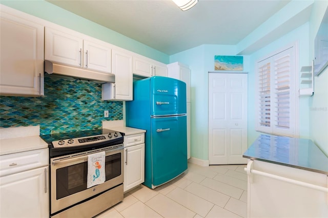 16500 Gulf Blvd Unit 352, North Redington Beach, FL 33708 - kitchen with stainless steel electric range oven, under cabinet range hood, refrigerator, and white cabinets