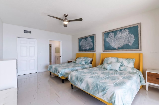 16500 Gulf Blvd Unit 352, North Redington Beach, FL 33708 - tiled bedroom featuring baseboards, a ceiling fan, and connected bathroom