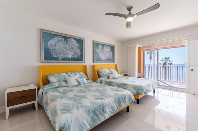 16500 Gulf Blvd Unit 352, North Redington Beach, FL 33708 - tiled bedroom with access to exterior and ceiling fan