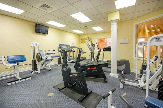 16500 Gulf Blvd Unit 352, North Redington Beach, FL 33708 - gym featuring a paneled ceiling, carpet flooring, and baseboards