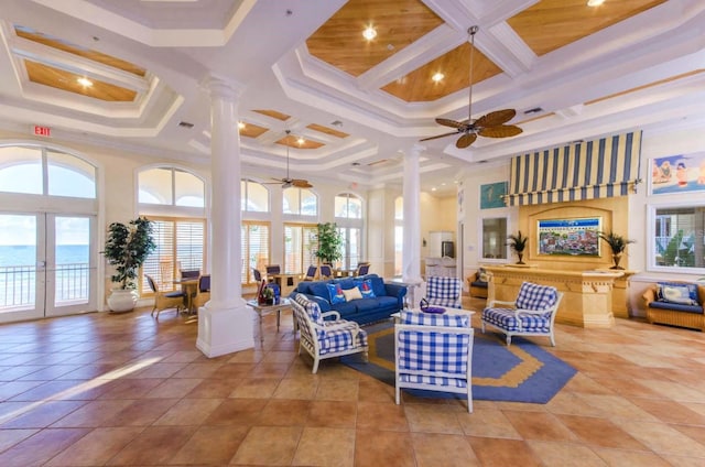 16500 Gulf Blvd Unit 352, North Redington Beach, FL 33708 - living room with decorative columns, a ceiling fan, coffered ceiling, french doors, and a towering ceiling