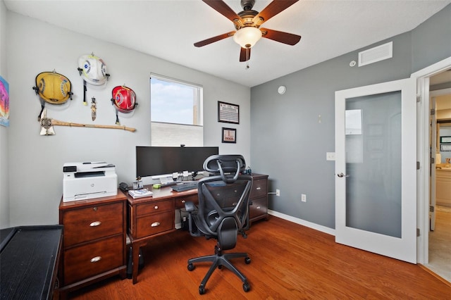 office area with hardwood / wood-style floors and ceiling fan