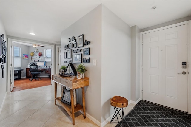 entrance foyer featuring light hardwood / wood-style floors and ceiling fan