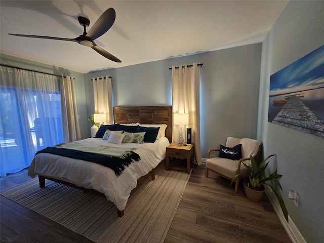 bedroom featuring ceiling fan and wood-type flooring