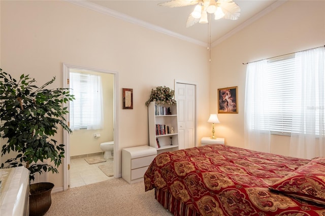 24617 Laurel Ridge Dr, Lutz, FL 33559 - carpeted bedroom featuring crown molding, ensuite bathroom, baseboards, and tile patterned floors
