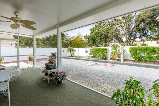 24617 Laurel Ridge Dr, Lutz, FL 33559 - unfurnished sunroom with a ceiling fan