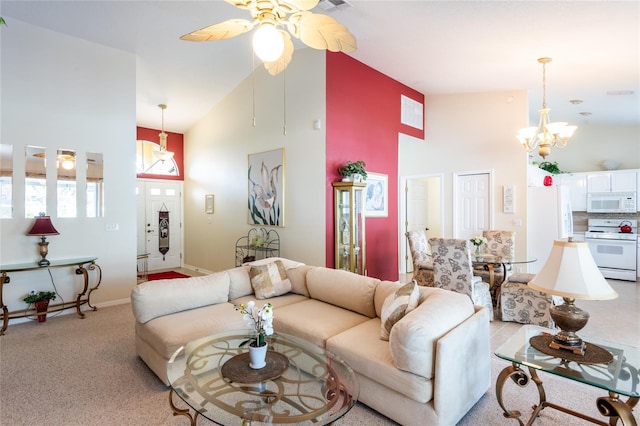 24617 Laurel Ridge Dr, Lutz, FL 33559 - living room featuring high vaulted ceiling, a ceiling fan, a chandelier, light carpet, and baseboards