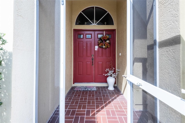 24617 Laurel Ridge Dr, Lutz, FL 33559 - view of exterior entry with stucco siding