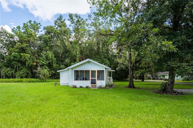 exterior space with a yard