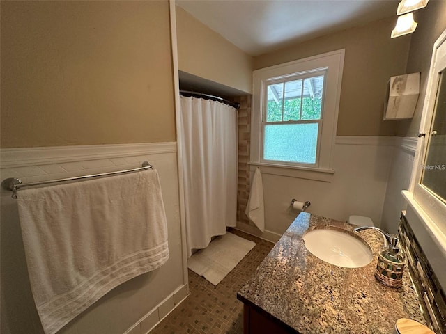 bathroom with vanity and a shower with curtain