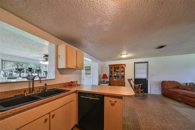 kitchen with sink, kitchen peninsula, light brown cabinets, a textured ceiling, and black dishwasher