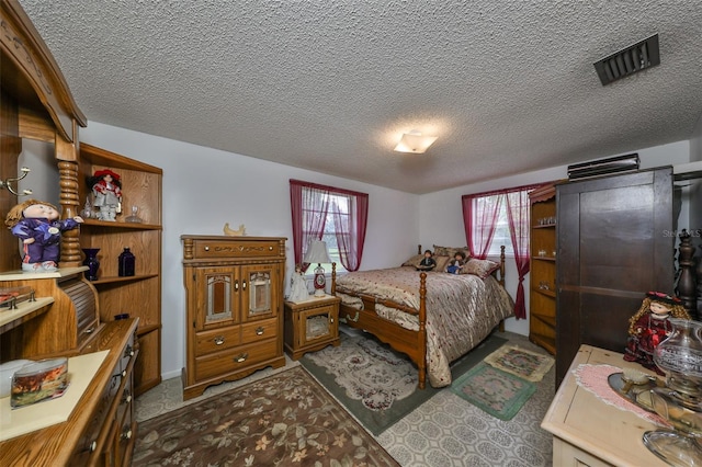 bedroom with a textured ceiling