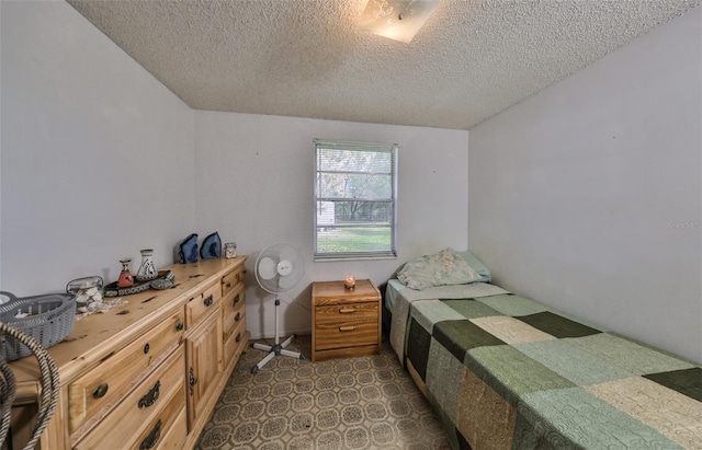 bedroom featuring a textured ceiling