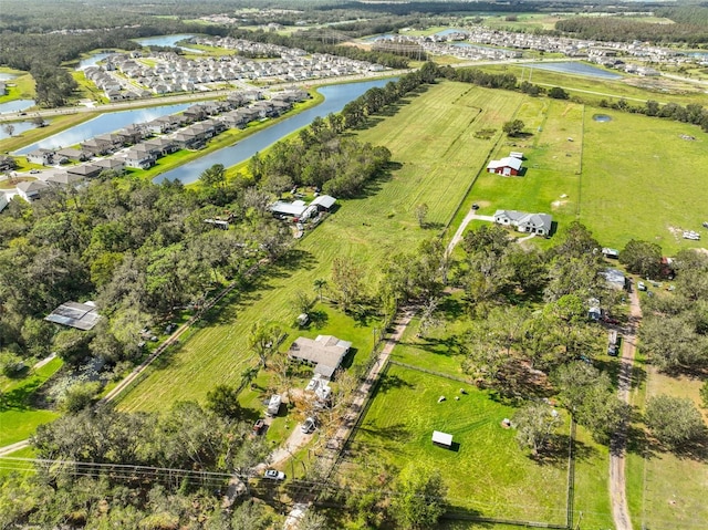 bird's eye view featuring a rural view and a water view