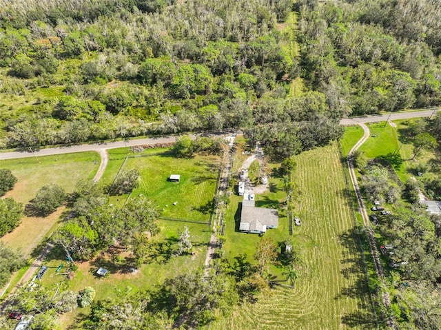 birds eye view of property featuring a rural view