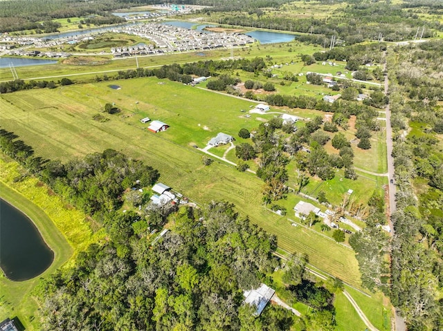 bird's eye view with a water view and a rural view