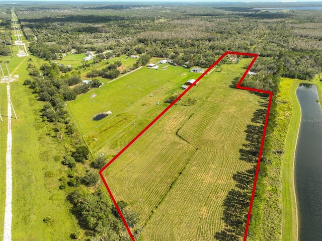 aerial view featuring a water view and a rural view