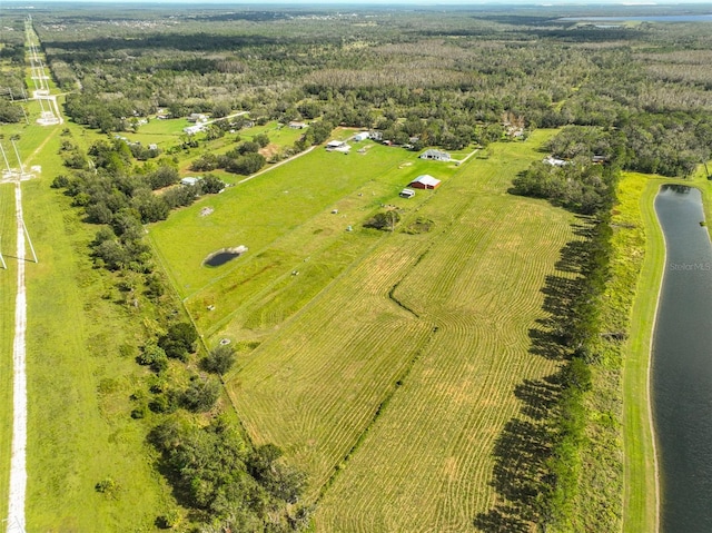 aerial view featuring a water view and a rural view