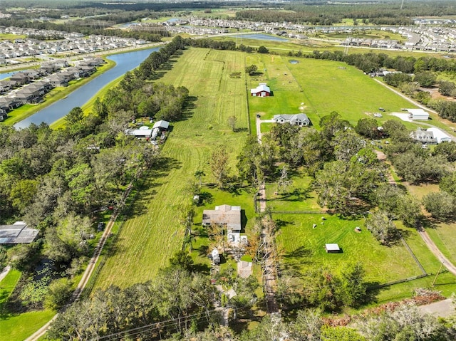 aerial view featuring a rural view and a water view