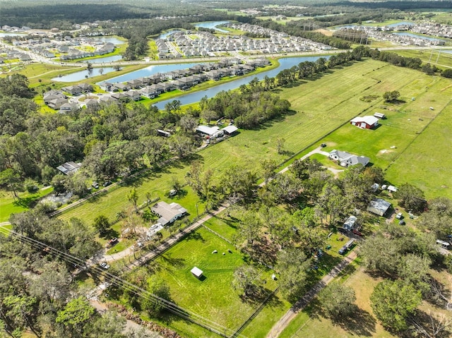 bird's eye view with a rural view and a water view