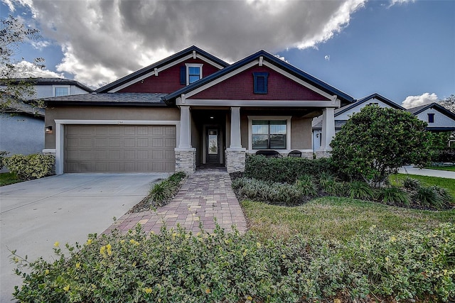 craftsman-style home with a garage