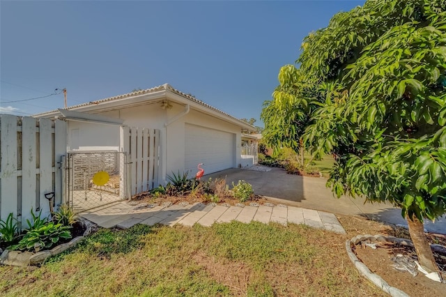 view of home's exterior with a garage