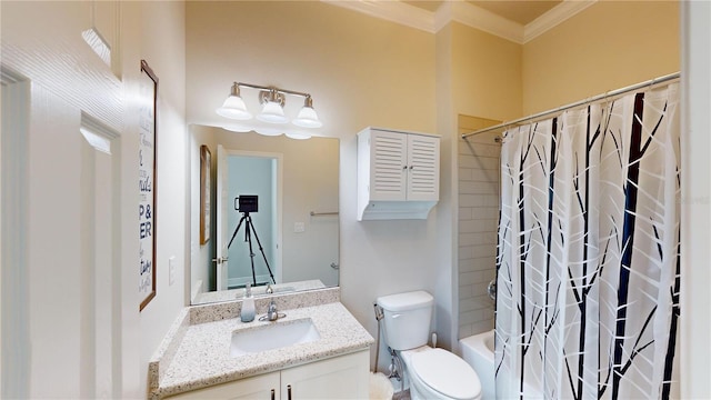 full bathroom featuring toilet, vanity, shower / bath combo with shower curtain, and crown molding