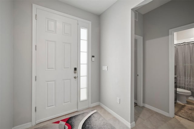 tiled entrance foyer with plenty of natural light