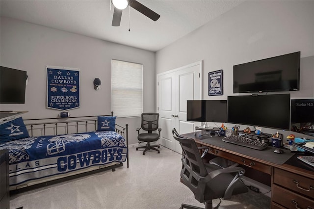 bedroom with light carpet and ceiling fan